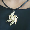 AMY FLOWER KNOT BURST PENDANT NECKLACE