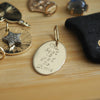 LOGAN OVAL 14K BURST DISC CHARM  - TWO SIDED