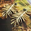 COLBIE PALM STATEMENT EARRINGS