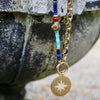 UMA NORTH STAR CUTOUT DISC PENDANT NECKLACE- 1.1/4"